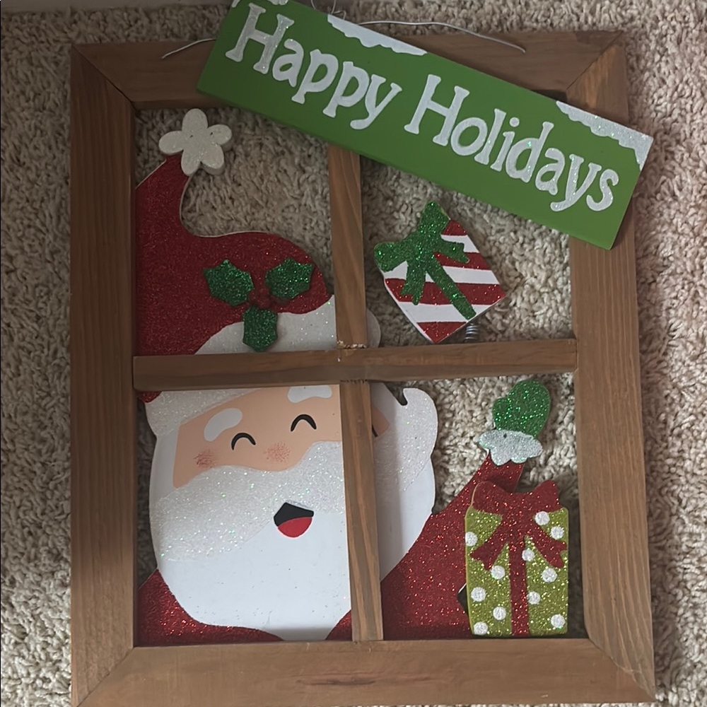 Festive Santa Window Decoration with Green Accents